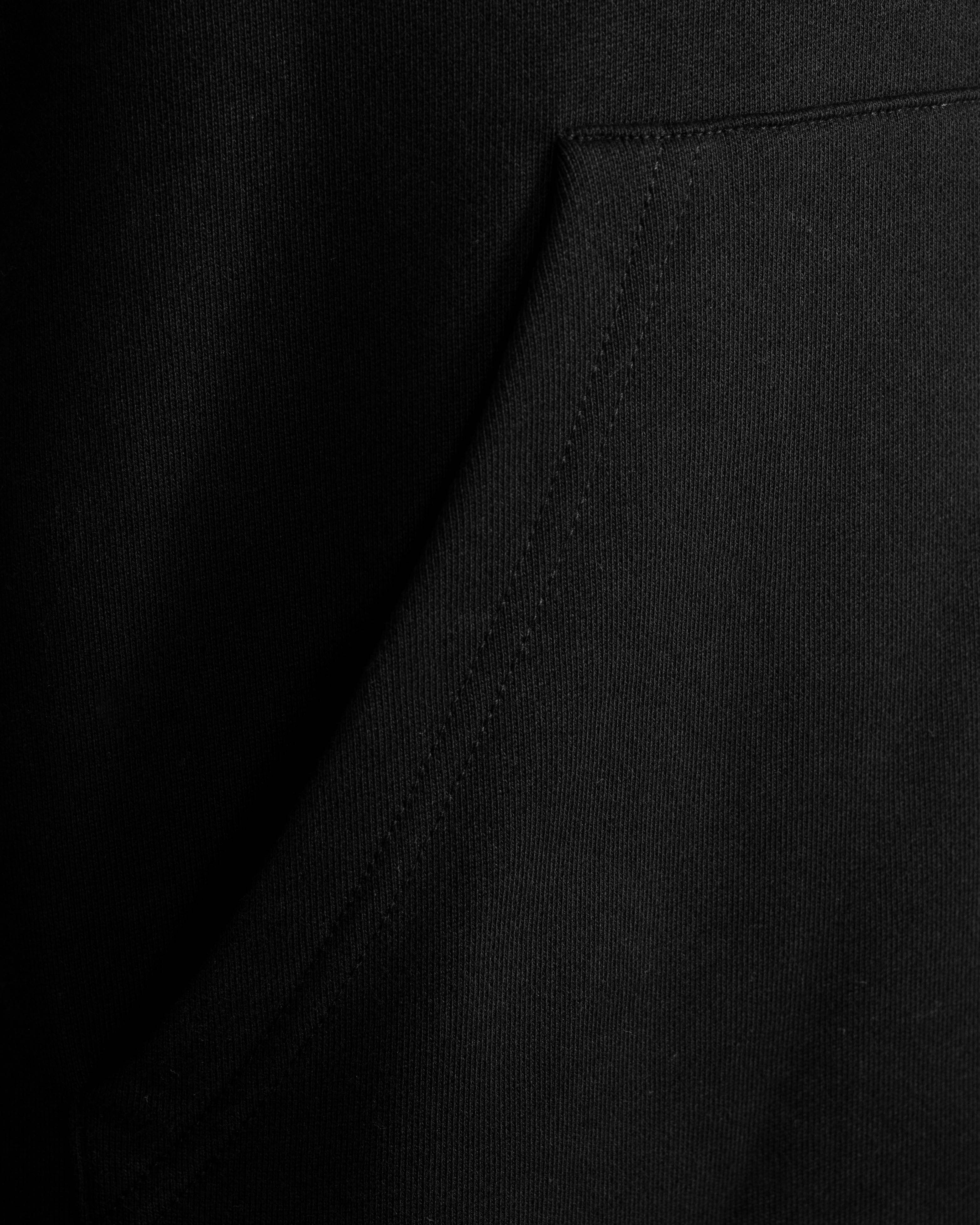 Rhythm Unisex Hooded Sweater with pocket "United in Humanity" - Image 3